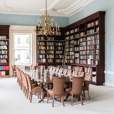 A meeting set up boardroom style in the library