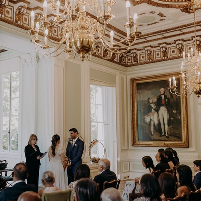 Bride and groom getting married in the Council Room