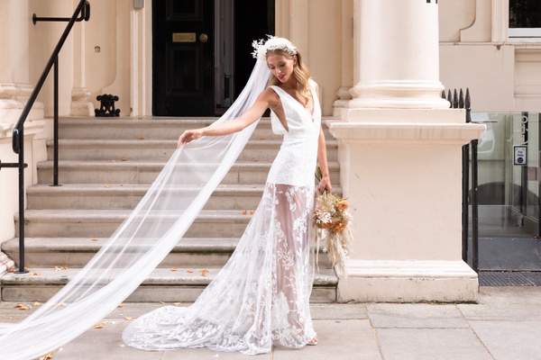 Bride stood outside of small wedding venue London Carlton House Terrace