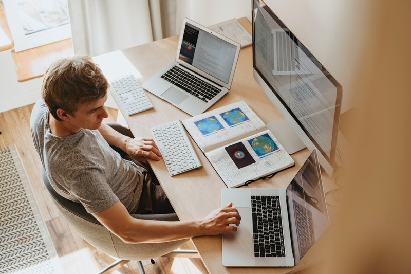 working on laptop from desk
