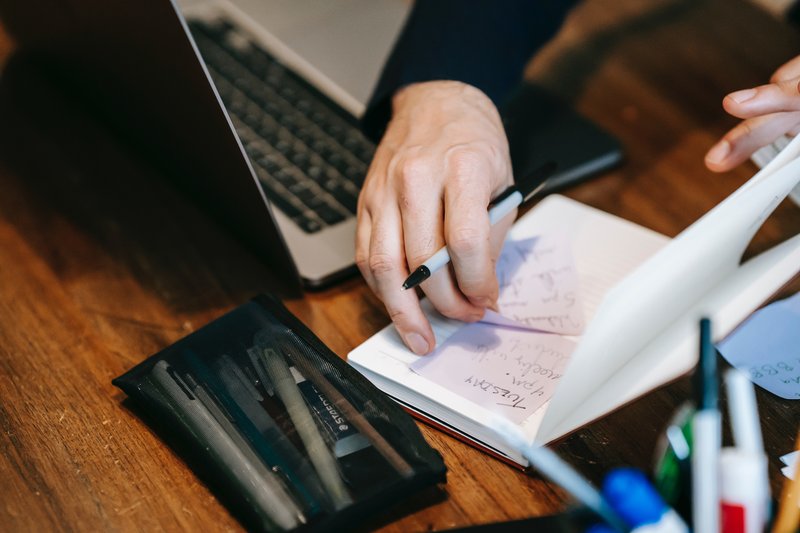 writing and working with laptop