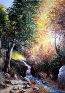 The sun rises over the waterfall