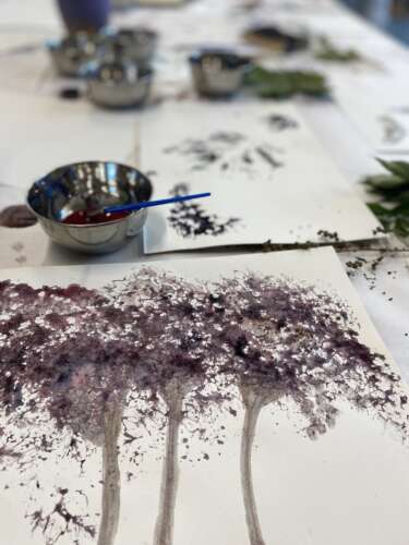 A painting of trees done with watercolour