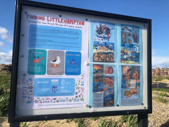 The sign that invites people to follow one of the way-finding routes around Littlehampton is displayed outside.