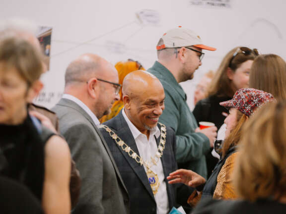 The councillor and mayor for Portsmouth talk to people at the opening of Playland Creative Hub.