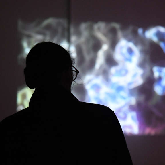 Projections of colourful patterns in a dark room