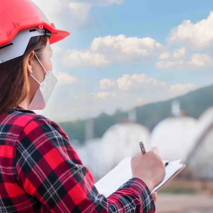 Petrochemical engineer checking gas storage industry