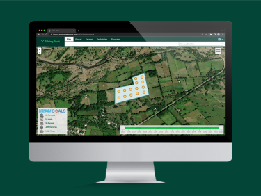 A computer screen showing satellite images of an area of land with symbols