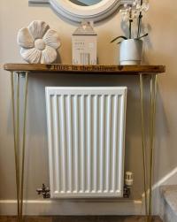 We get so many queries around our radiator table made for life_with_lissie_ so we have to feature it on our grid!🤎

These can be made to various sizes with any engraved text. Legs are supplied from the amazing thehairpinlegco and can be ordered in various sizes and colours. Just drop us a message if you would like to upgrade your legs from the standard black! 🖤

You can order directly from the website and qualify for free shipping! 📦🤩🎉

#therollingcow #engraved #engravedgifts #personalised #wood #giftshop #homegifts #laserengraved #laser #decor #personalisedgifts #shopsmall #supportasmallbusiness #home #garden #giftcard #consoletable #radiatortable #hairpin #hairpinlegs #sidetable #personalisedtable