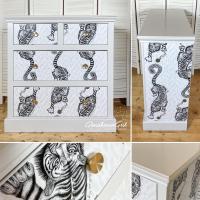 ROARING SUCCESS?!

Just finished photography of this commissioned piece and I think it is my favourite so far… A lot of upcycled pieces feature dark colours to make them a statement piece but it’s worth thinking about how lighter colourways can still work and be more harmonious and effective especially in a smaller room.

The tigers are so long in this wallpaper design that it took me over two hours just to decide where they should be placed! I think it was worth it though and I hope to offer more of this design via my website soon and show you the matching wardrobe tomorrow but please do get in touch in the meantime if you’re inspired and want your own piece commissioned. 😘

The paper used is Tigris by emmajshipley from clarke_clarke_interiors in the Monochrome colourway. The frame has been painted in Helmi 10 (TVT1915) from tikkurila_uk to closely match Farrow and Ball’s Cornforth White before top coating everything in Rocktop satin varnish by smith_rodger_shellacs . The gold disc ha
