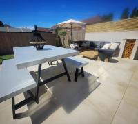 Absolutely love how this table and bench set came out. 
Finished in forcrete_ Fossil 1 micro quartz medium creating a real polished concrete look and feel.
Legs are from thehairpinlegco powder coated in a matt black. Thanks for these, they look incredible.
Looks great on this patio coupled with the outdoor sofa from madedotcom