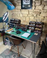 I’ve been inundated with zero questions about my approved hobby space so I thought it high time I show you. 

Desk by thehairpinlegco 
Chair found by nessyb1979 
Storage set up by frontierwargaming 
Brushes by artisopusltd 
Large cutting mat from dead Grandfather. 

#warhammercommunity #hobbyspace #warhammer40k #blacktemplars #agentsoftheimperium #deathwatch #inquisitor #landraiderredeemer