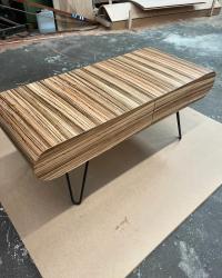 Bespoke Zebrano coffee table with a concealed drawer, black hairpin legs from the thehairpinlegco satin varnish finish. #rpgbespokecarpentry #carpenter #carpentry #wood #woodwork #furniture #bespoketables #zebranoveneer #zebrano #coffeetable #hairpinlegs thehairpinlegco #concealeddrawer