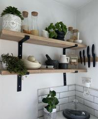 SHELFIE 

Loving the new open shelving in the kitchen. I’d just like a few rustic chopping boards to add to here and I think I’m good to go. 

I’m finally starting to like the kitchen after it’s budget make over. I’ll put some of the before on stories if you fancy a look. 

I’ve painted the cabinets… well three times actually as the paint kept changing colour in the light from this big window! Isn’t it funny how it can look completely different in different lights. After new tiles and worktops all I need is to get the oak laminate flooring down that I’ve already purchased and at some point in time get a ledger door and this space will be completed. 

Shelves acumencollection 

Dipping tray very_lt_interiors
 
Candle holder and spice bowl  nordichouse 

Plant pots flowersbyaimee71
 
Jug charnleyshomeandgarden 

Blind prioryoakinteriors 

Paint valsparpaintuk Rocky Mountain Mist. 

Oak knife block thehairpinlegco (previously gifted) 

#storyofmyhome
#myseasonalstyling  #myhousethroughalens #thehousefanatics  #allspacesgreatandsmall #sorealhomes #styleitlight #moderncottage #cottagestyle #shelfdecor #myrevampreveal #interiorstyling #myhomestyle #myinteriorstyle #cottagelife #preloveyourhome  #loveforhomeinteriors #loveyourspace #kitchenware #kitcheninspo #cottageliving #yourinspiringhome #realstylishhomes #sahstylists #yourhomemagazine #myhshome #wherewehome #homestylesmile #hyglaminspired #shelfstyling