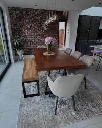 Dining Table: Solid Oak stokersfurniture. I stained the table top with a water based medium oak wood stain littlefairswoodfinishing and finished with wood beeswax furnitureclinic  for a deeper, richer feel. I updated the table legs thehairpinlegco for a more industrial look. Dining Chairs: Bronx grey housingunits  Large Wooden bench _woodsfurniture . Textured mottled grey rug costco_uk Lighting: lamplightersgallery.co.uk  Home grown flowers Hydrangeas 🌺