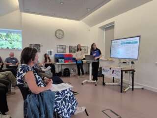 Picture of presentation at Who's Who event
