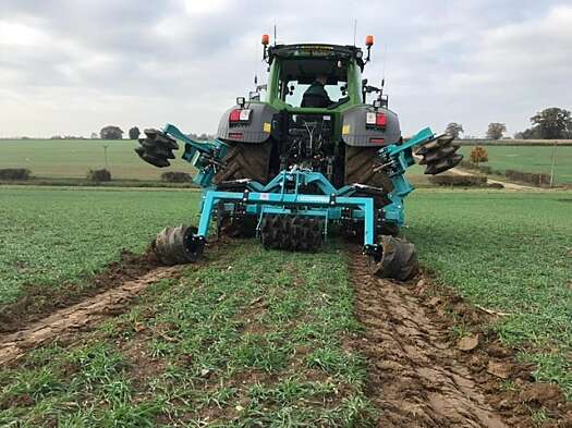 Tractor spraying crops in Norfolk