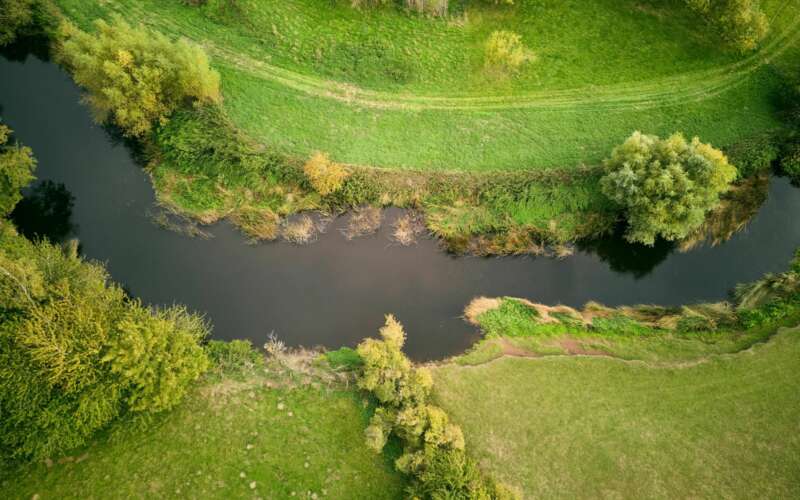 Aerial image of a river with fields either side