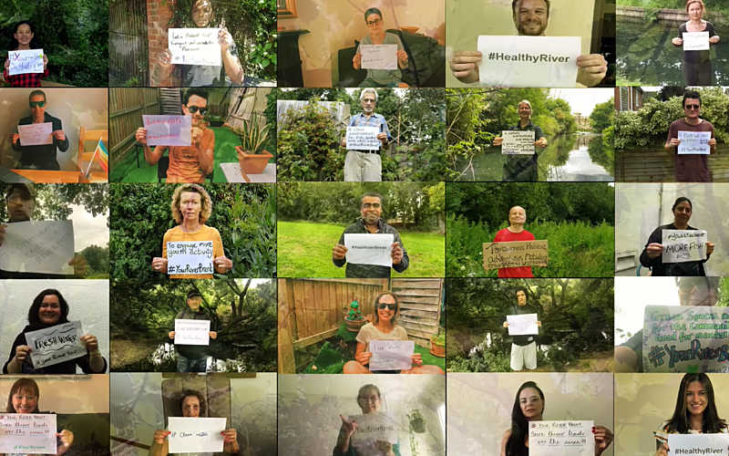 people holding signs in support of rivers