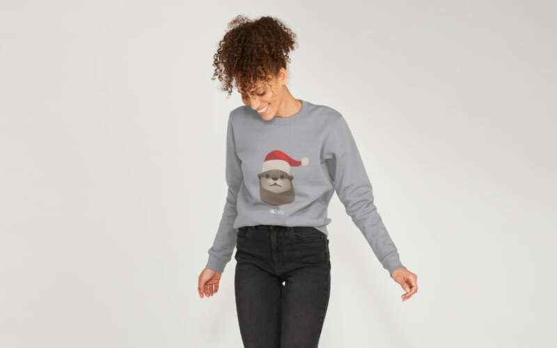Woman wearing a Rivers Trust jumper