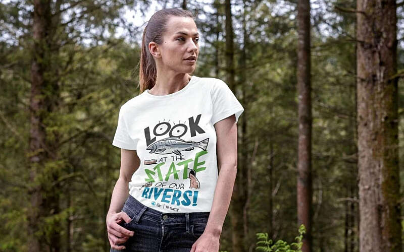 Woman in Rivers Trust t-shirt with Look at the State of our Rivers on the front