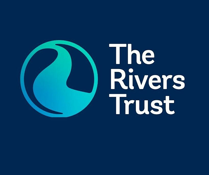 RT logo with white writing on dark background