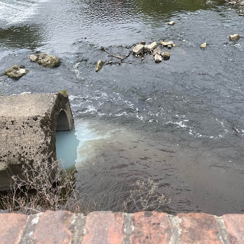 Pollution into river from pipe