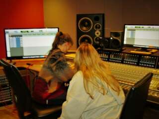 two women in a recording studio