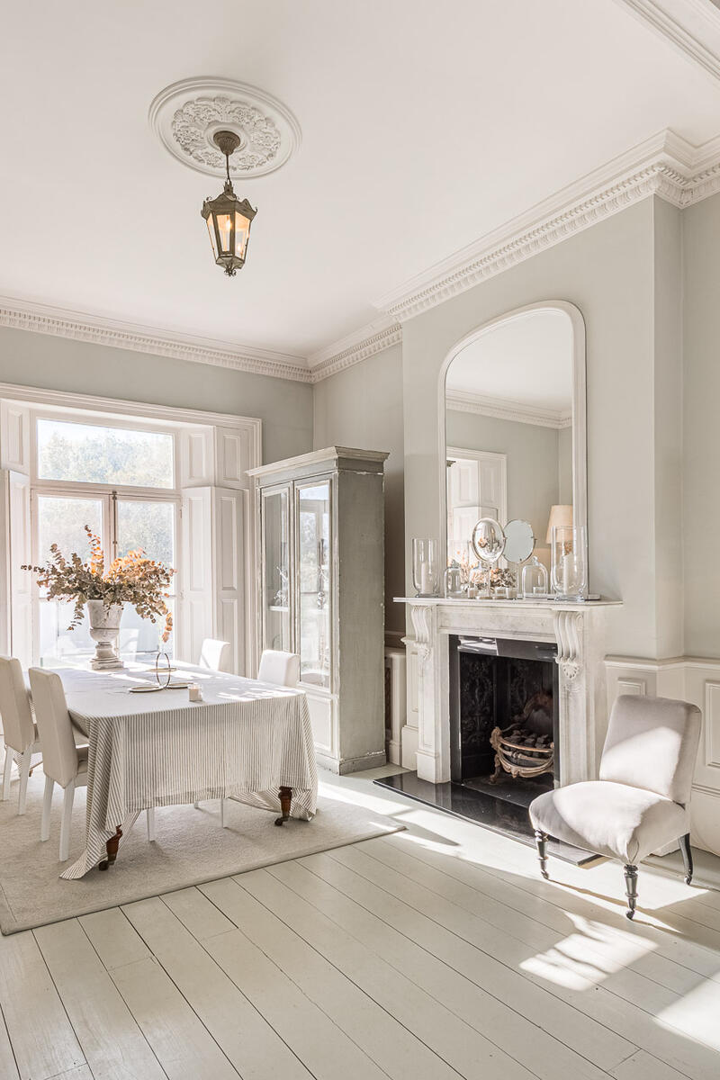 Georgian dining room with fireplace, crown moulding and neutral interiors, ideal for photoshoots