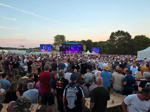 View towards the main stage with a music act performing at ABR Festival in June 2026