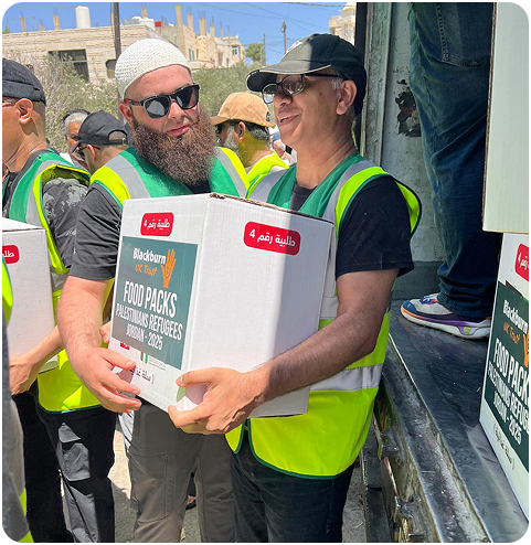 BUKT Volunteers Loading Aid