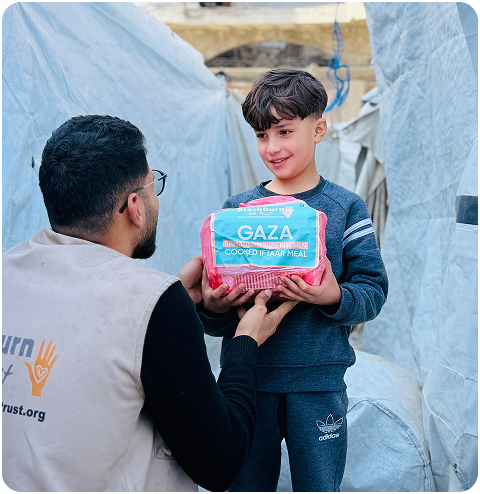 BUKT Volunteer with Child