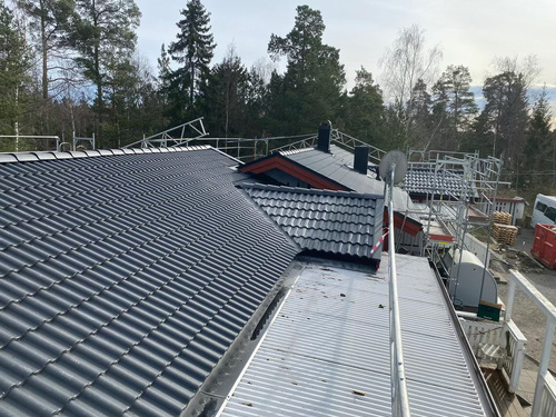 Takläggare Täby