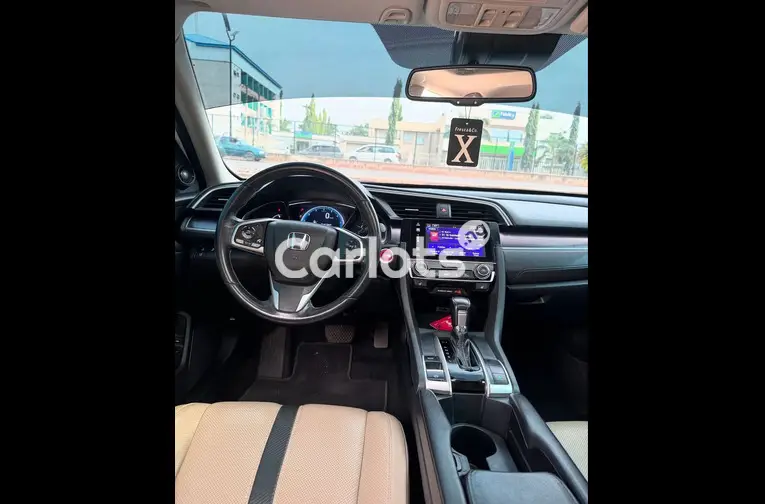 FOREIGN USED 2017 HONDA CIVIC TOURING - 2/5