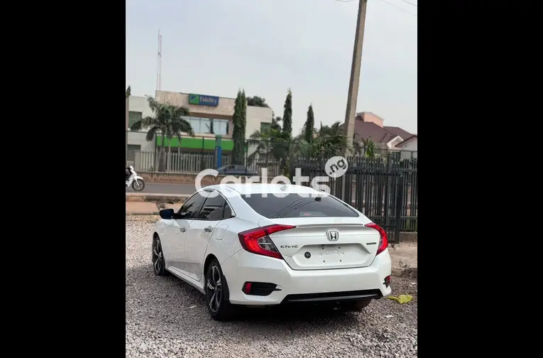 FOREIGN USED 2017 HONDA CIVIC TOURING - 4/5