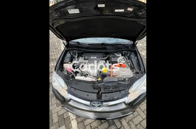 FOREIGN USED 2015 TOYOTA CAMRY HYBRID LE - 4/5
