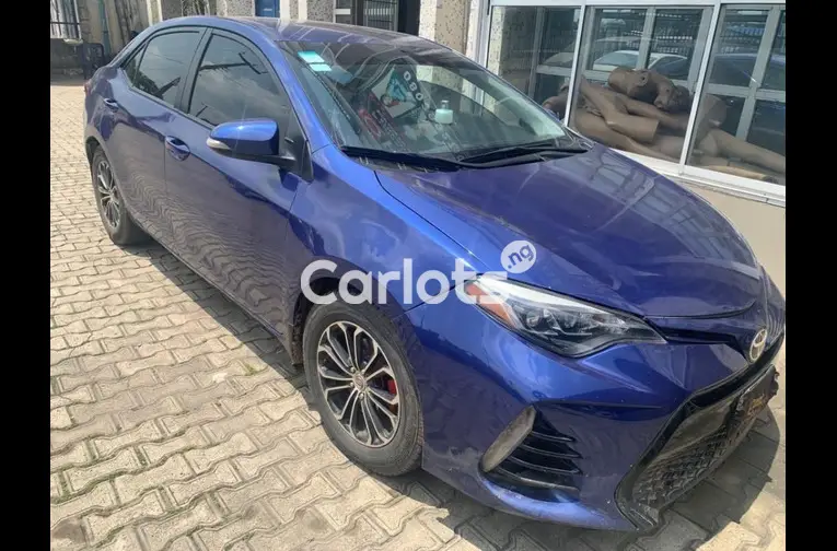 PRE-OWNED 2015⬆️2017 TOYOTA COROLLA SPORT - 4/5