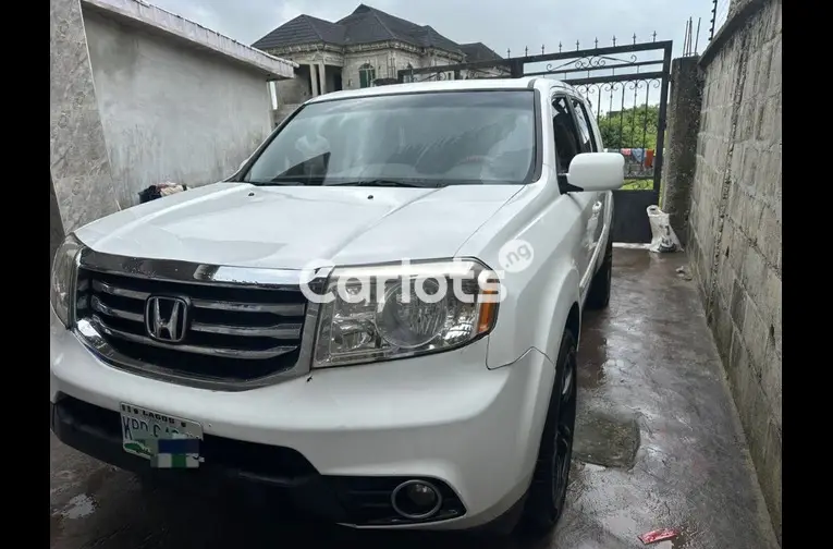 BRIEFLY USED BUT NOT REGISTERED 2012 HONDA PILOT