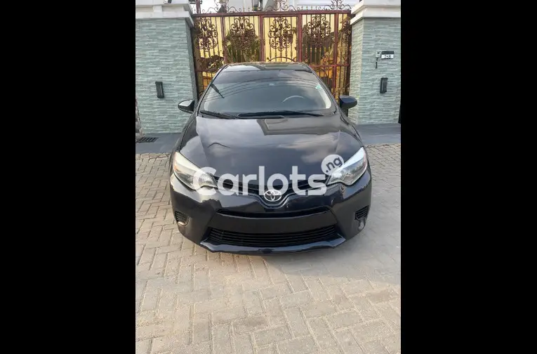 FEW MONTHS REGISTERED 2015 TOYOTA COROLLA LE