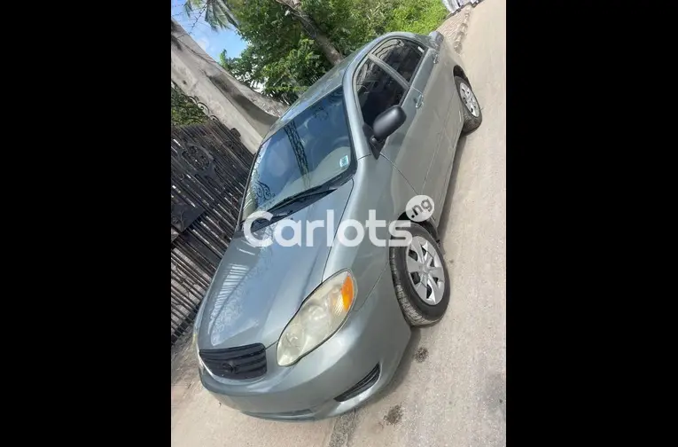UBER STANDARD 2004 TOYOTA COROLLA - 6/7