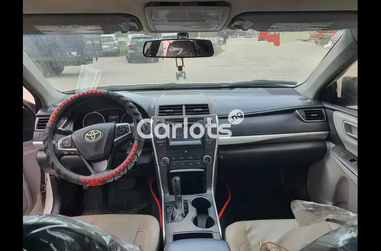 Registered 2015 Toyota Camry SE (white) - 4/7