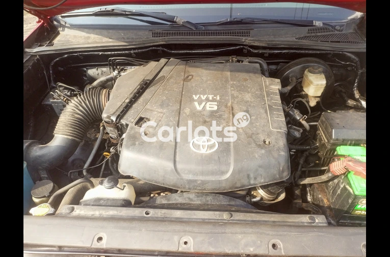 Toyota Tacoma 2008 red pickup - 2/7