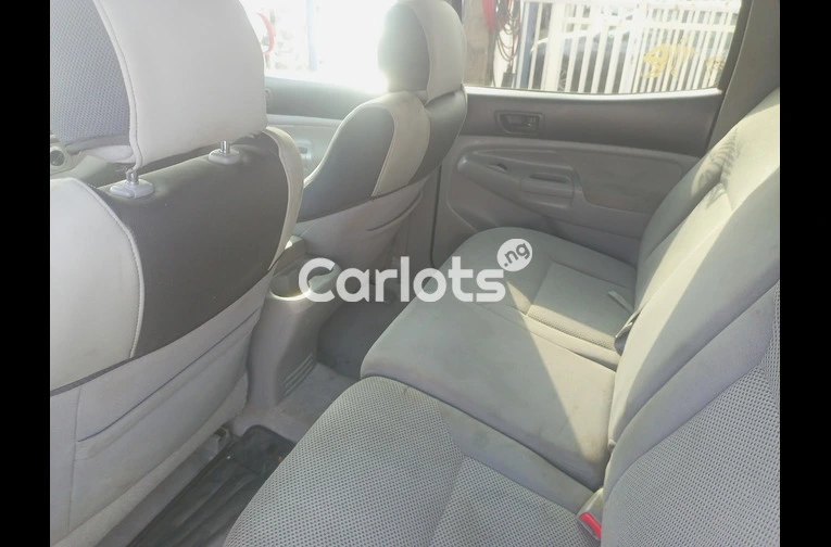 Toyota Tacoma 2008 red pickup - 4/7