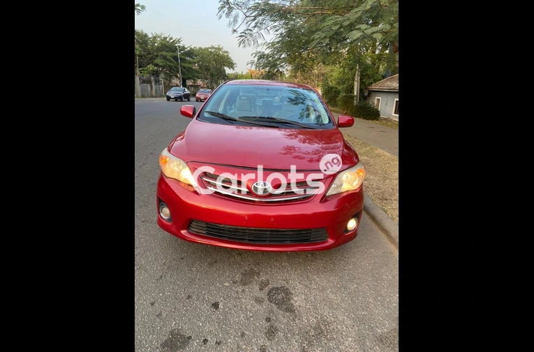 NEATLY USED 2013 TOYOTA COROLLA