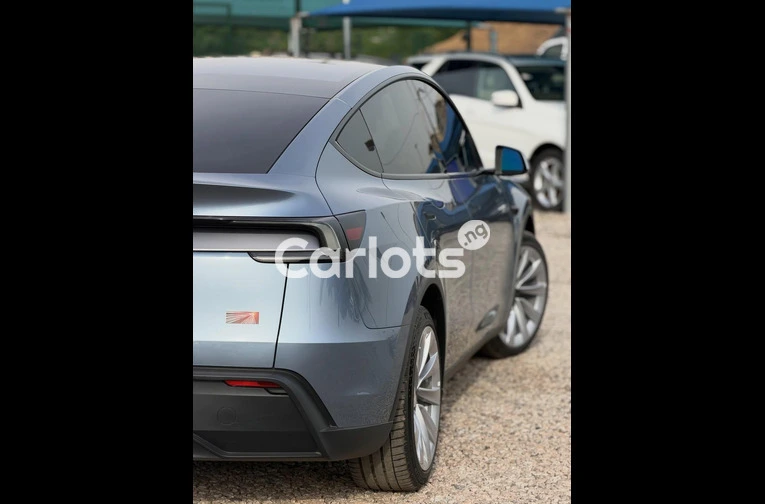 2025 TESLA MODEL Y+ - 1/7