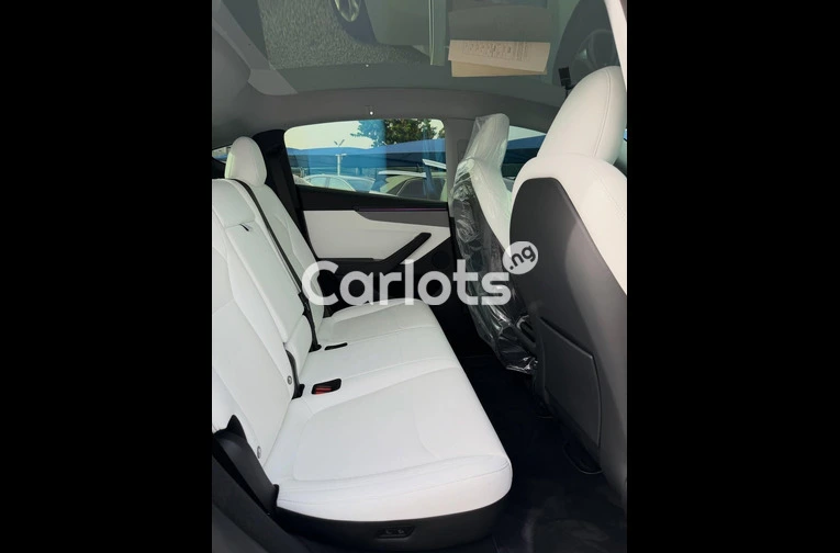 2025 TESLA MODEL Y+ - 5/7