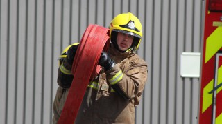 Firefighters douse tractor ‘well alight in a field’