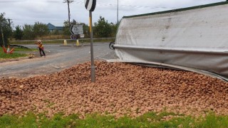 Trailer transporting potatoes overturns on Scottish road