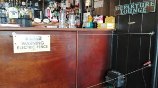Pub installs electric fence to ensure social distancing at bar