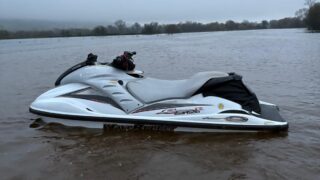 Watch: Young farmer jet-skis across flooded field